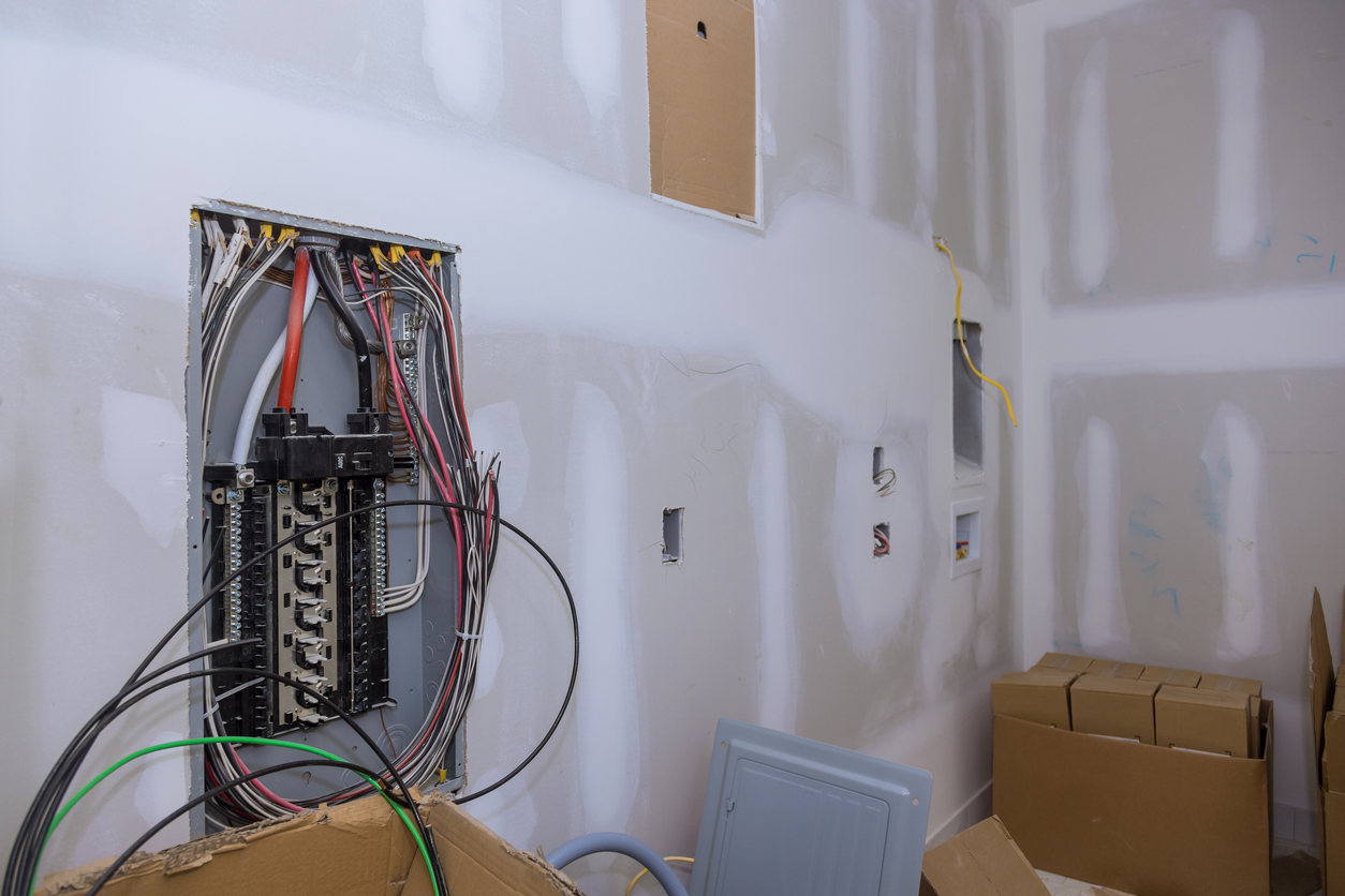 Close up circuit breakers and wire in control panel Lakewood Electrical Panel Upgrade